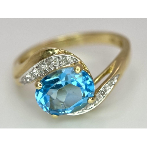 260 - A Very Good Quality, Hallmarked 1998, 9 Carat Yellow Gold Blue Topaz and Diamond Set Ring Size P. Se... 