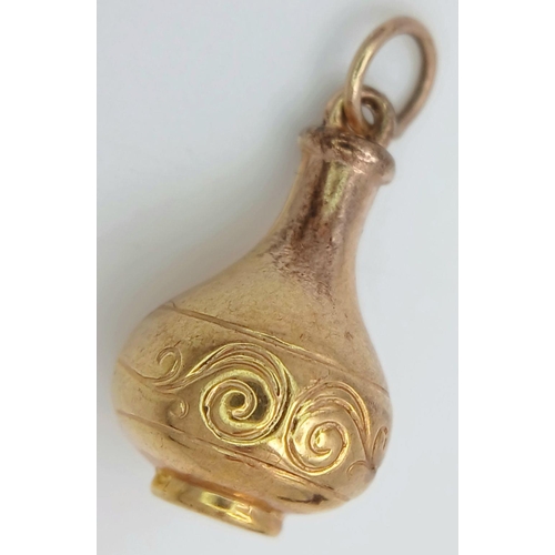 273 - Hallmarked  9 carat GOLD CHARM in the form of a Wine Flask. 1.06 grams.