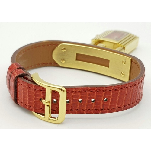 276 - A HERMES OF PARIS NOVELTY PADLOCK ON A BRACELET LADIES WATCH , GOLD PLATED AND ON A RED HERMES LEATH... 