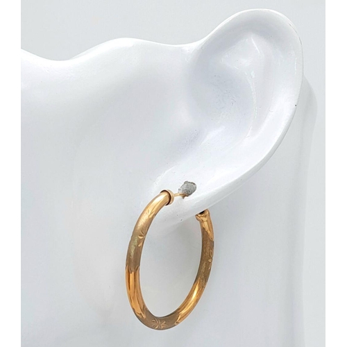 319 - A Pair of Vintage 9K Yellow Gold Hoop Earrings. 3cm diameter. 1.9g total weight.