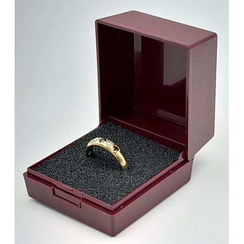 343 - 9 carat GOLD SPINEL and ZIRCONIA RING. Full UK hallmark. Complete with ring box .1.9 grams. Size N.