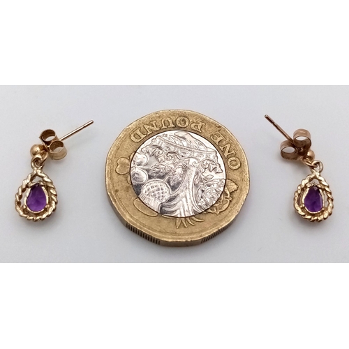 357 - Pair of 9 carat GOLD and AMETHYST EARRINGS. Pear Cut drop style. Complete with 9 carat gold backs. F... 