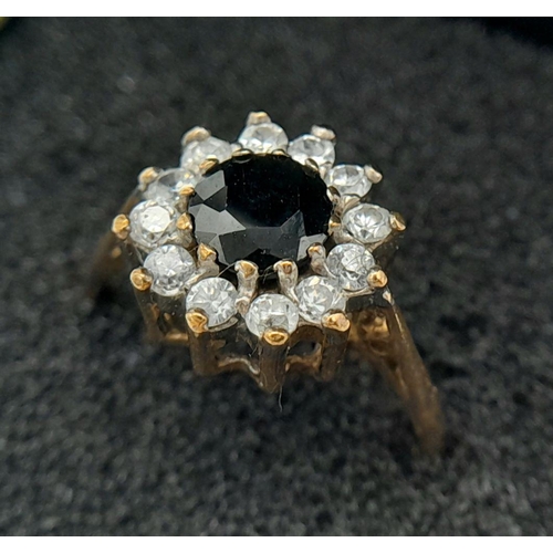 413 - Stunning  9 carat GOLD RING,  having lab SAPPHIRE set to top with sparkling ZIRCONIA surround. Fully... 