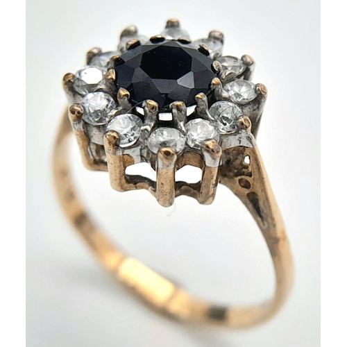 413 - Stunning  9 carat GOLD RING,  having lab SAPPHIRE set to top with sparkling ZIRCONIA surround. Fully... 