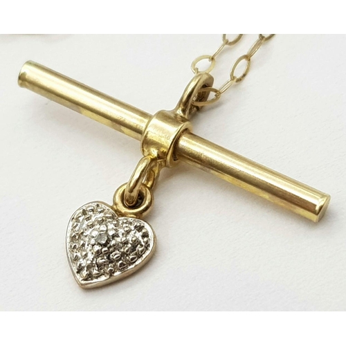 438 - A 9K Yellow Gold stone set T-bar Heart pendant on 16