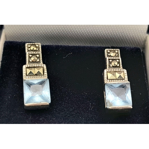 476 - Beautiful vintage pair of SILVER and SWISS BLUE TOPAZ EARRINGS. Having Silver Marcasite detail with ... 