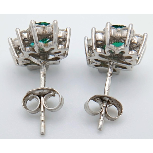 526 - A pair of 9K White Gold (tested as) Stone Set Cluster Earrings.  2.3g in total weight. Ref 1619I