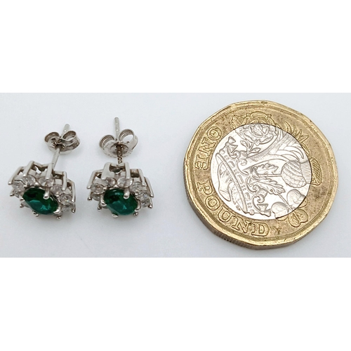 526 - A pair of 9K White Gold (tested as) Stone Set Cluster Earrings.  2.3g in total weight. Ref 1619I