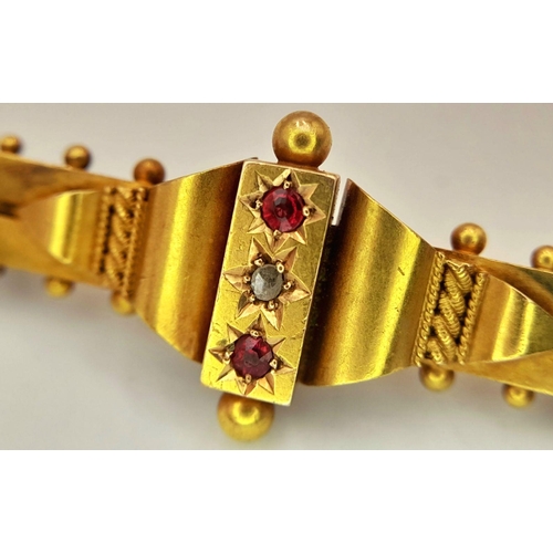 58 - A 15K GOLD ART DECO BROOCH WITH RUBIES AND A DIAMOND .   3.1gms