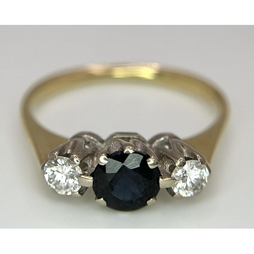 60 - AN 18K Yellow Gold Sapphire and Diamond Trilogy Ring. Size N - O. 3.3g total weight.