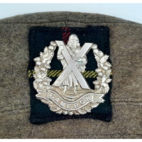 608 - 1944 Dated Scottish Tam O Shanter Badged to the Cameron Highlanders.