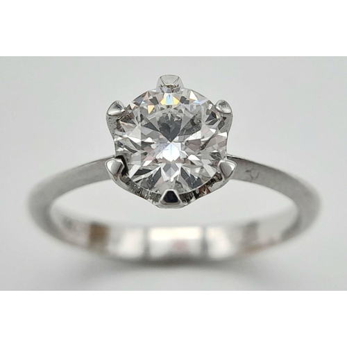 66 - An 18K White Gold Diamond Solitaire Ring. 1.01ct brilliant round cut diamond. SI1/F. Size N. Comes w... 