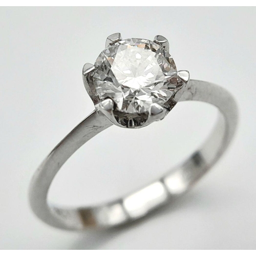 66 - An 18K White Gold Diamond Solitaire Ring. 1.01ct brilliant round cut diamond. SI1/F. Size N. Comes w... 