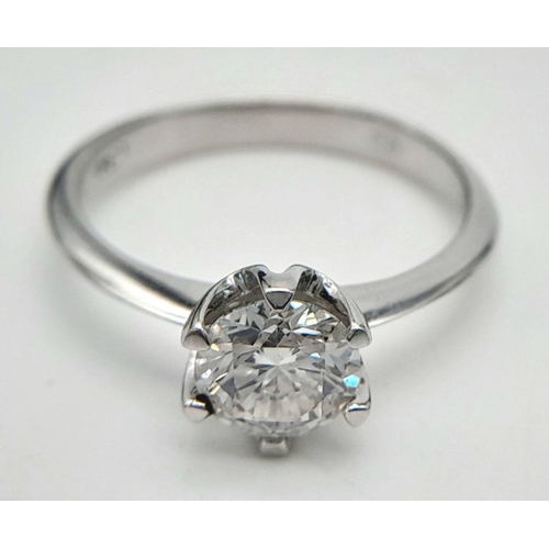 66 - An 18K White Gold Diamond Solitaire Ring. 1.01ct brilliant round cut diamond. SI1/F. Size N. Comes w... 