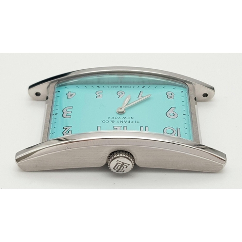 73 - A TIFFANY & CO STAINLESS STEEL LADIES WATCH IN LANDSCAPE  STYLE  , WITH STUNNING BLUE DIAL COMPLETE ... 