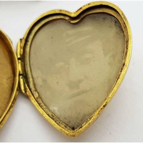 79 - AN ANTIQUE 15K GOLD LOCKET DATED 1916 ATTACHED TO A 15K GOLD BROOCH (PIN MISSING)   7.2gms