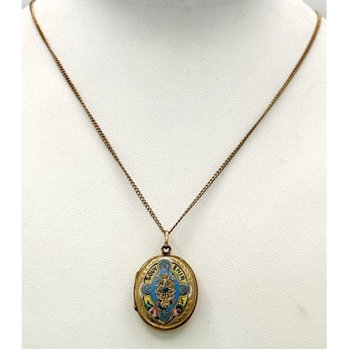 85 - A VINTAGE SOUVENIR ENAMALLED LOCKET ON A 9K GOLD CHAIN . 10gms