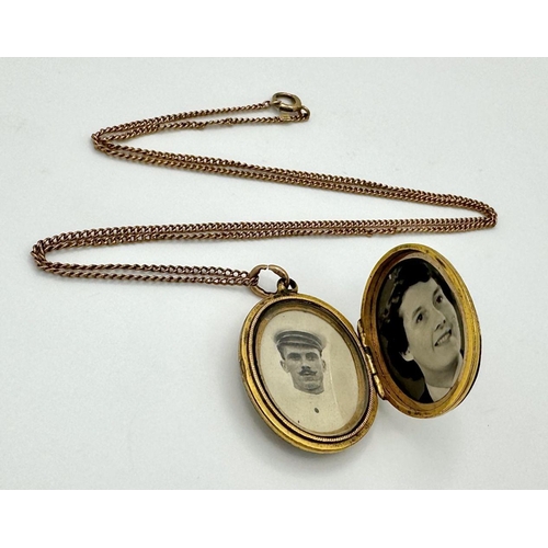 85 - A VINTAGE SOUVENIR ENAMALLED LOCKET ON A 9K GOLD CHAIN . 10gms