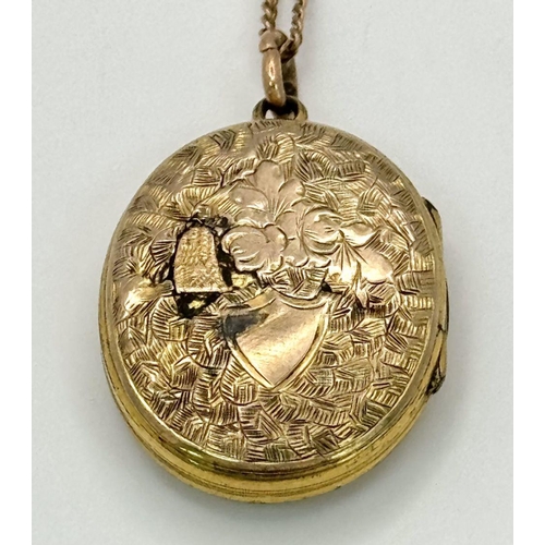 85 - A VINTAGE SOUVENIR ENAMALLED LOCKET ON A 9K GOLD CHAIN . 10gms