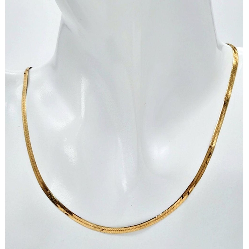 92 - A 40cms FLAT HERRINGBONE LINK NECKLACE IN 9K GOLD .     3.3GMS