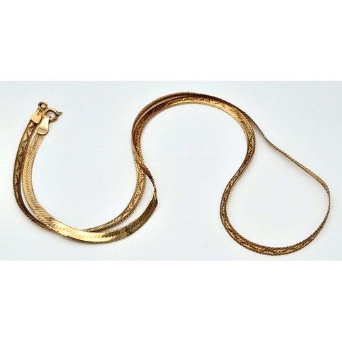 92 - A 40cms FLAT HERRINGBONE LINK NECKLACE IN 9K GOLD .     3.3GMS