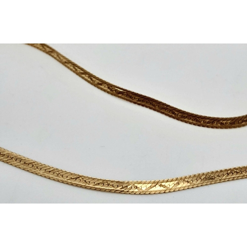 92 - A 40cms FLAT HERRINGBONE LINK NECKLACE IN 9K GOLD .     3.3GMS