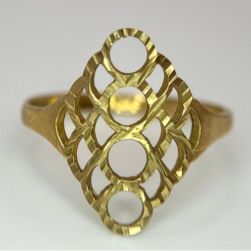 241 - A 9K Yellow Gold Ring with Pierced Circle Decoration. Size N. 1.4g.