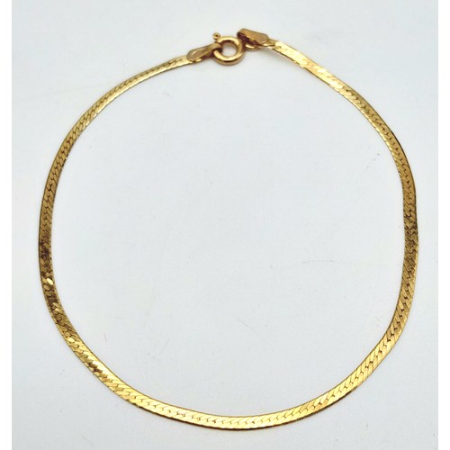 288 - A 9K Yellow Gold Herringbone Bracelet. 16cm. 1.05g.