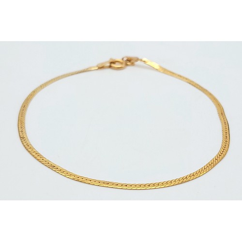 288 - A 9K Yellow Gold Herringbone Bracelet. 16cm. 1.05g.