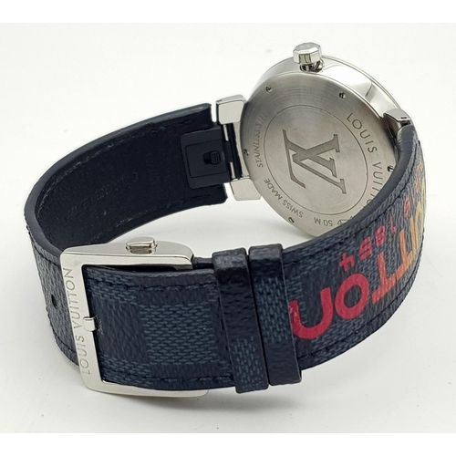 155 - A LOUIS VUITTON OVERSIZED UNISEX CELEBRATION WATCH IN STAINLESS STEEL WITH STRIPED DIAL , QUARTZ MOV... 