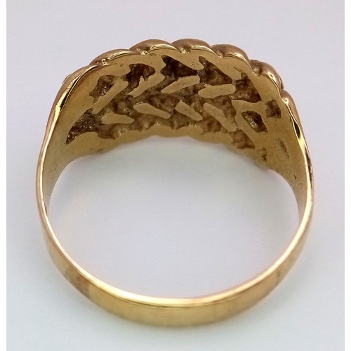 114 - A Vintage 9K Yellow Gold Keeper Ring. Size O. 3.67g