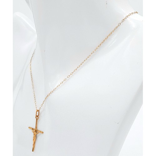 211 - A 9K Yellow Gold Crucifix on a 9K Yellow Gold Disappearing Necklace. Pendant - 3cm. 42cm necklace. 0... 