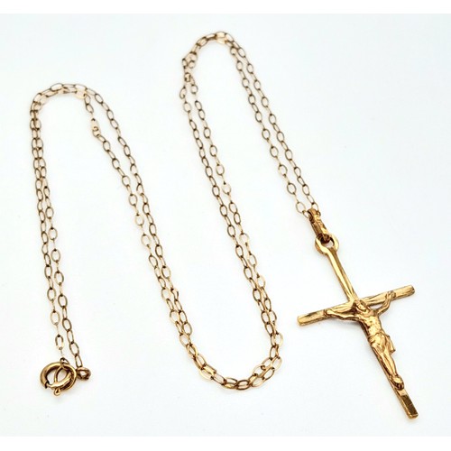 211 - A 9K Yellow Gold Crucifix on a 9K Yellow Gold Disappearing Necklace. Pendant - 3cm. 42cm necklace. 0... 