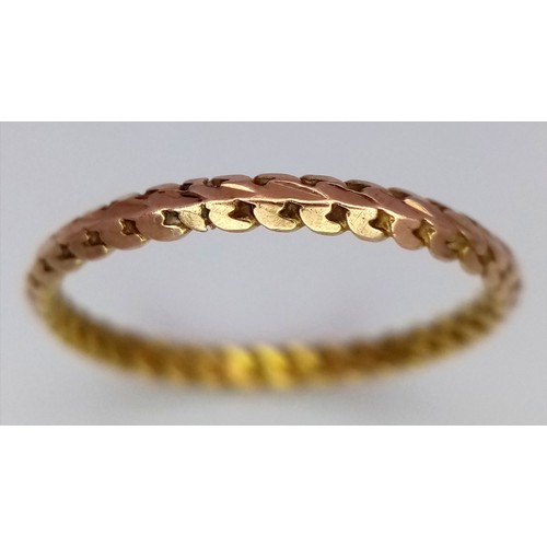 317 - An 18K Yellow Gold (tested) Decorative Thin Band Ring. Size N. 1g