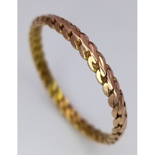 317 - An 18K Yellow Gold (tested) Decorative Thin Band Ring. Size N. 1g