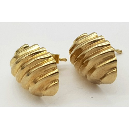 405 - A Pair of 9K Yellow Gold Shell Earrings. 15mm. 0.75g weight.