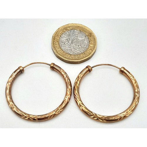 440 - A Vintage Pair of 9K Yellow Gold Hoop Earrings. 3cm diameter. 1.75g total weight.