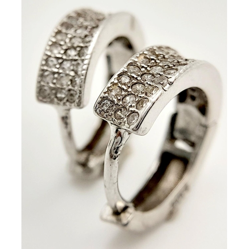 1509 - A stylish pair of 925 silver stone set hoop earrings. Total weight 3G.