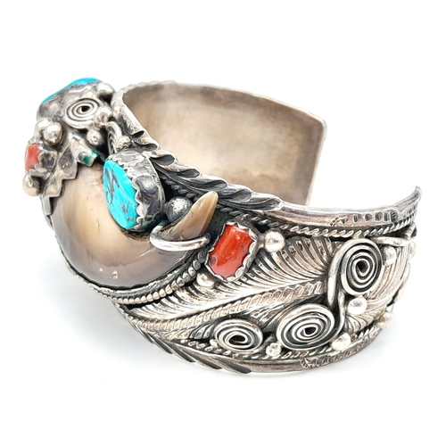 204 - A vintage designer ( Percy Spencer) sterling silver cuff bangle featuring Turquoise, blood coral and... 