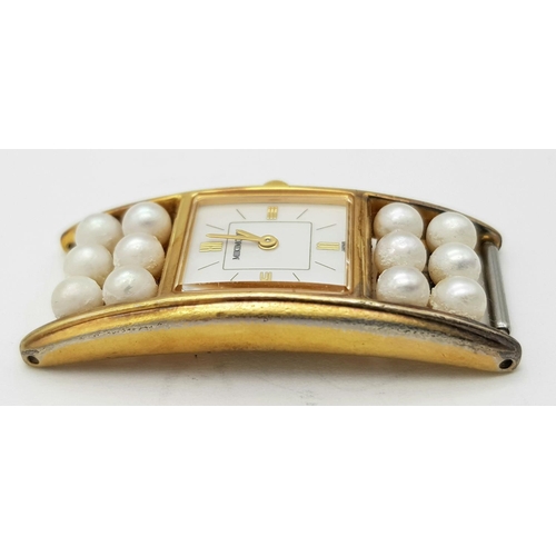 498 - A Mikimoto Gold plated Sterling Silver Watch Case with Pearl Decoration. Quartz movement. In need of... 