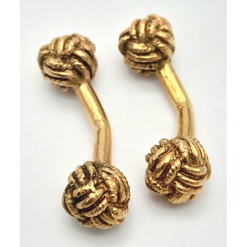 100 - A Pair of 9K Yellow Gold Decorative Knot Cufflinks. 11g.