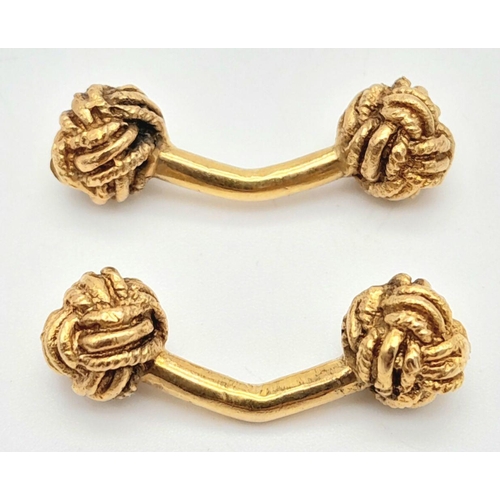 100 - A Pair of 9K Yellow Gold Decorative Knot Cufflinks. 11g.