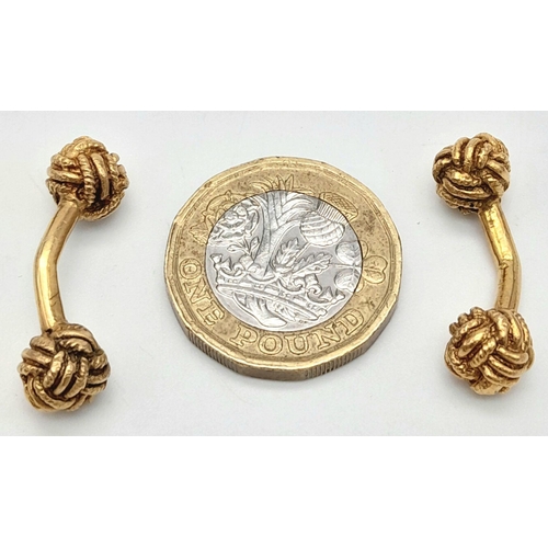 100 - A Pair of 9K Yellow Gold Decorative Knot Cufflinks. 11g.