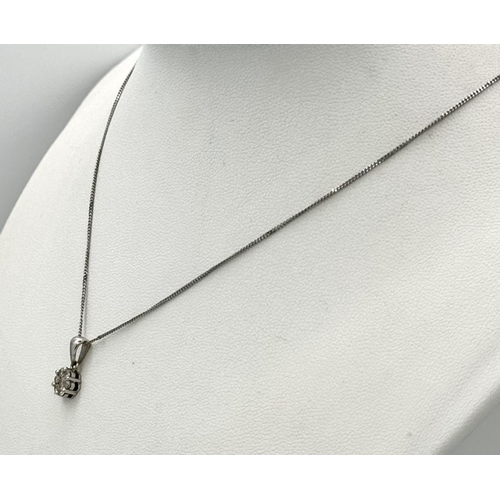 274 - A 9K White Gold Diamond Pendant on a 9K White Gold Disappearing Necklace. 15mm pendant. 44cm necklac... 