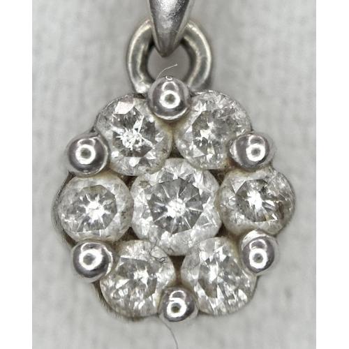 274 - A 9K White Gold Diamond Pendant on a 9K White Gold Disappearing Necklace. 15mm pendant. 44cm necklac... 