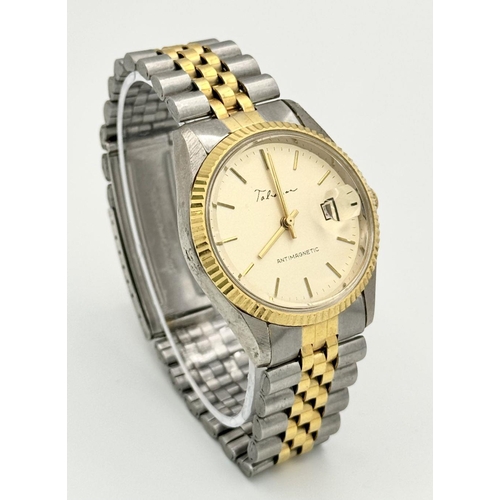 392 - Gentleman’s vintage TALISMAN WRISTWATCH. Having Silver & Gold Tone stainless steel Bracelet with Gol... 