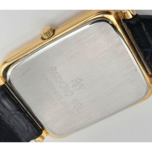 412 - A Vintage Raymond Weil Quartz Tank Watch. Black leather strap with original buckle. Gilded case - 29... 