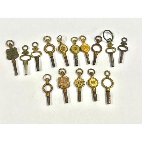 557 - An Antique pocket watch keys.