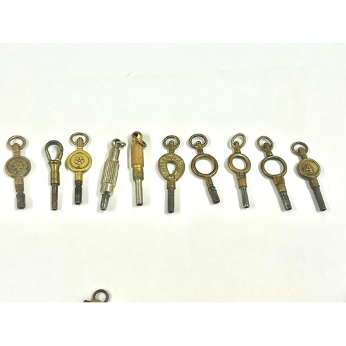 571 - An Antique pocket watch keys.