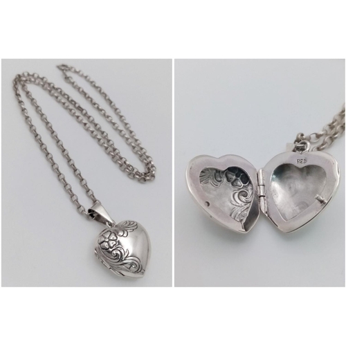 1503 - A 925 silver heart locket pendant on sterling silver belcher chain. Total weight 9.1G. Total length ... 